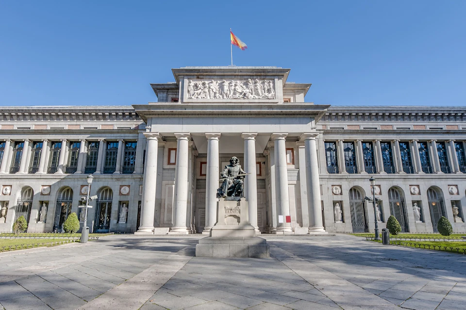 Facade of Prado Museum with Velazquez statue
